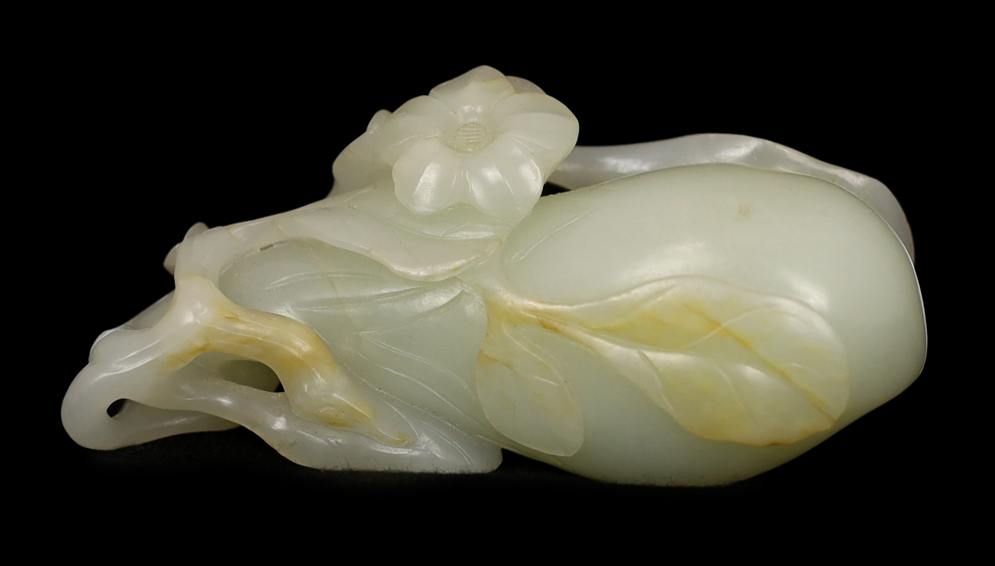 A Chinese pale celadon jade carving of a fruit, 18th century